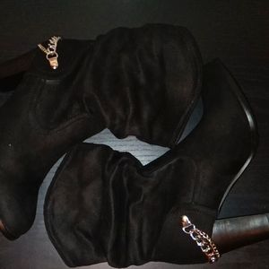 Brand new pair of black, size 7, women's boots.